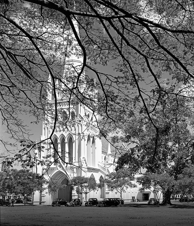 This photo of St Andrew’s Cathedral was taken in 1956 from a point near Coleman Street. Completed in 1861, the Anglican cathedral was designed by Ronald MacPherson and built by Indian convict labour. The original church on this site was designed by George D. Coleman and was completed in 1836. However, after two lightning strikes, it was demolished and replaced by this neo-Gothic structure. St Andrew’s Cathedral was gazetted as a national monument in 1973.