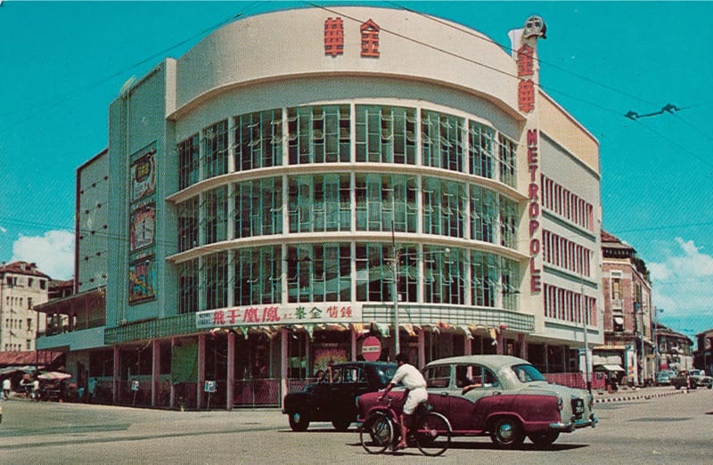 Metropole Theatre at the junction of Tanjong Pagar Road and Maxwell Road, late 1960s. The building, which has a curved facade with floor-to-ceiling windows, presently serves as the Fairfield Methodist Church. Collection of the National Museum of Singapore, National Heritage Board.