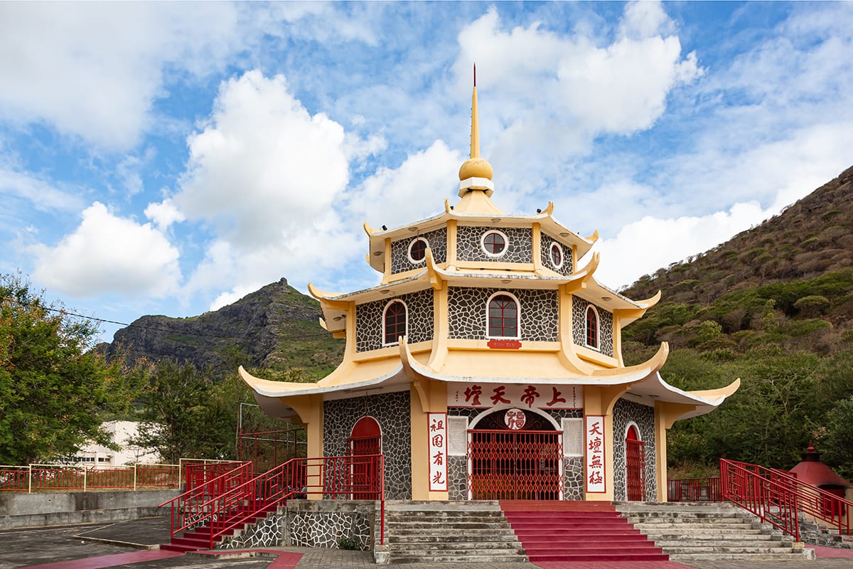 The Tien Tan Chinese Pagoda in the outskirts of Port Louis, Mauritius, 2023. Dr Jürgen Bochynek/Adobe Stock.