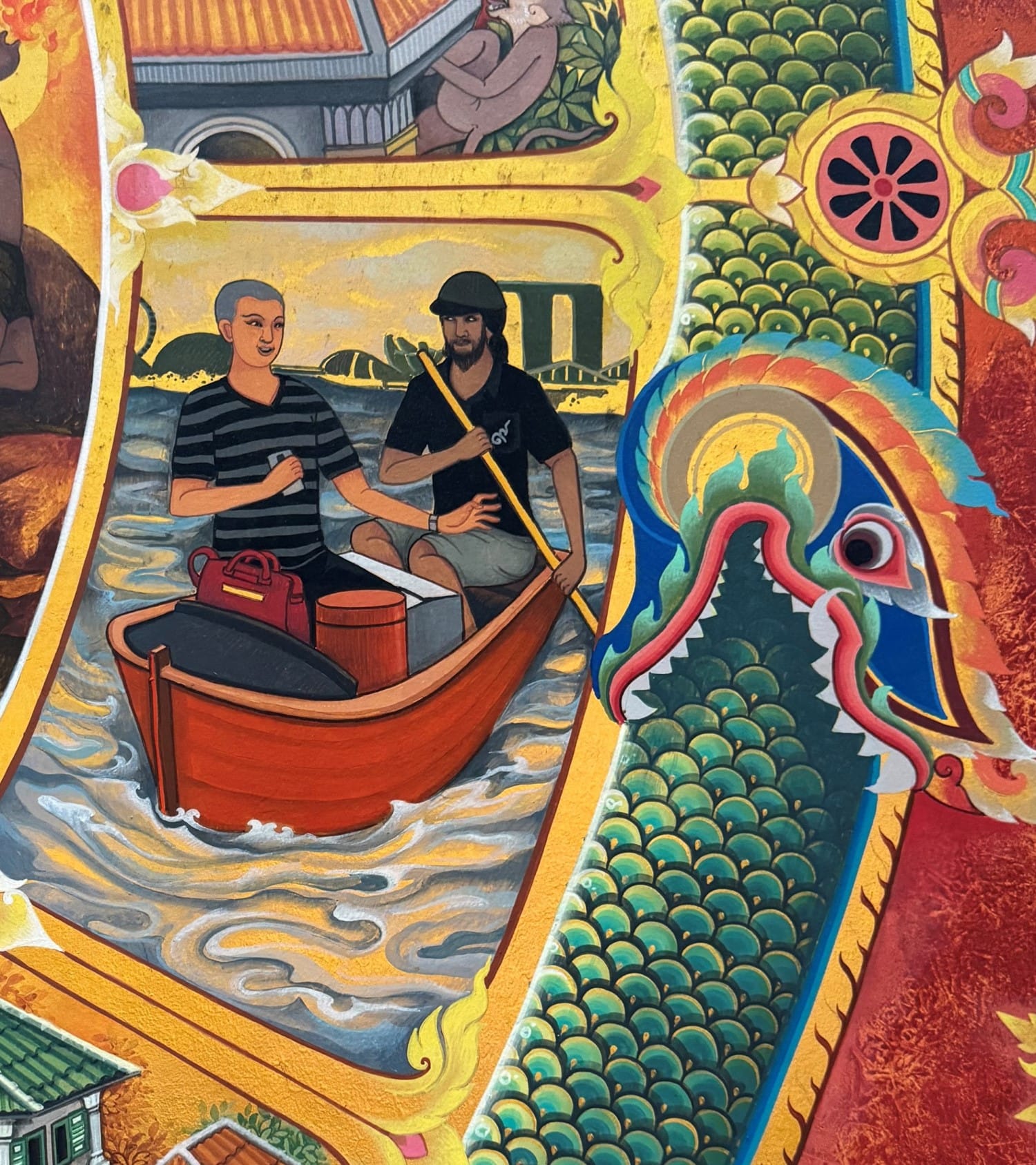 This detail from the wheel of life mural is from the fourth segment (clockwise) of the outermost layer. The scene with two men in a boat symbolises namarupa (“name and form”) or the constituent elements of mental and physical existence. Marina Bay Sands was added in as a local detail. Photo by Jimmy Yap.