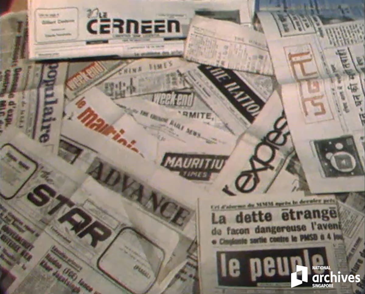 Mauritian dailies in a multitude of languages as seen in the documentary, Mauritius and Luxembourg – A Language Profile, aired during the televised discussion between Prime Minister Lee Kuan Yew and the three journalists on language competence and multi-lingual societies on 20 November 1979. Courtesy of Mediacorp Pte Ltd and National Archives of Singapore (Accession no. 1997001802).