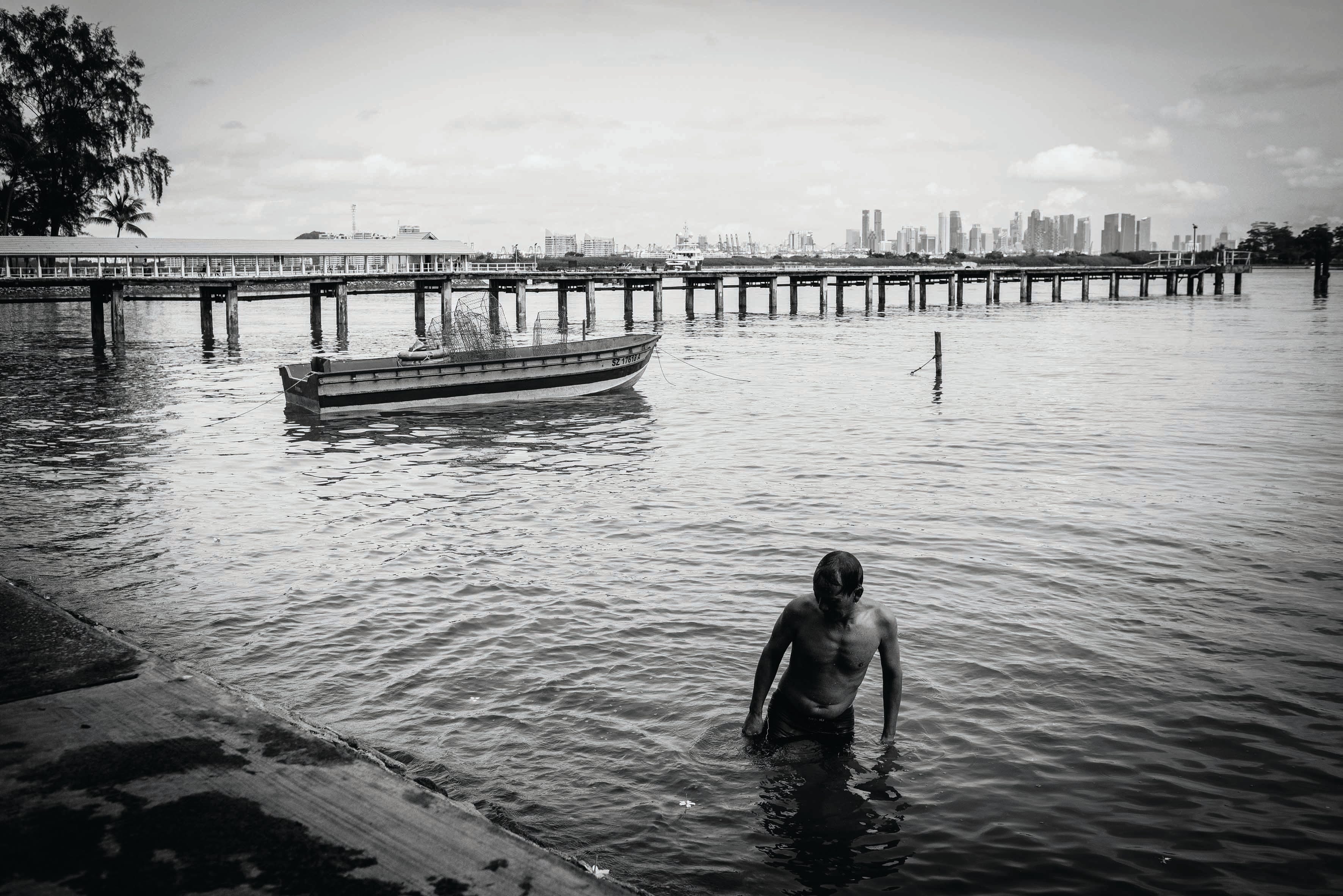 A man returning from his fishing trip on St John's Island. Photo by Edwin Koo. “Island Nation” is a documentary project by Captured, comprising Edwin Koo, Juliana Tan and Zakaria Zainal, that captures the stories of Singaporeans who once lived on the southern islands of Singapore. The exhibition will take place between April and June 2015 at the National Library Building and is part of Singapore's 50th National Day celebrations. Find out more at: www.facebook.com/islandnationsg. The website www.islandnation.sg will be launched in March 2015.
