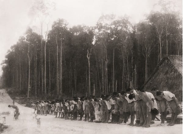 The morning roll call was a daily ritual at Bahau camp [Japanese propaganda photo]. Courtesy of Father René Nicolas.