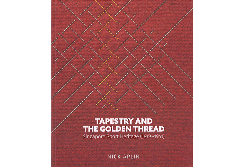 Red book cover with intersecting threads and the title "Tapestry and the Golden Thread: Singapore Sport Heritage (1819-1941)."