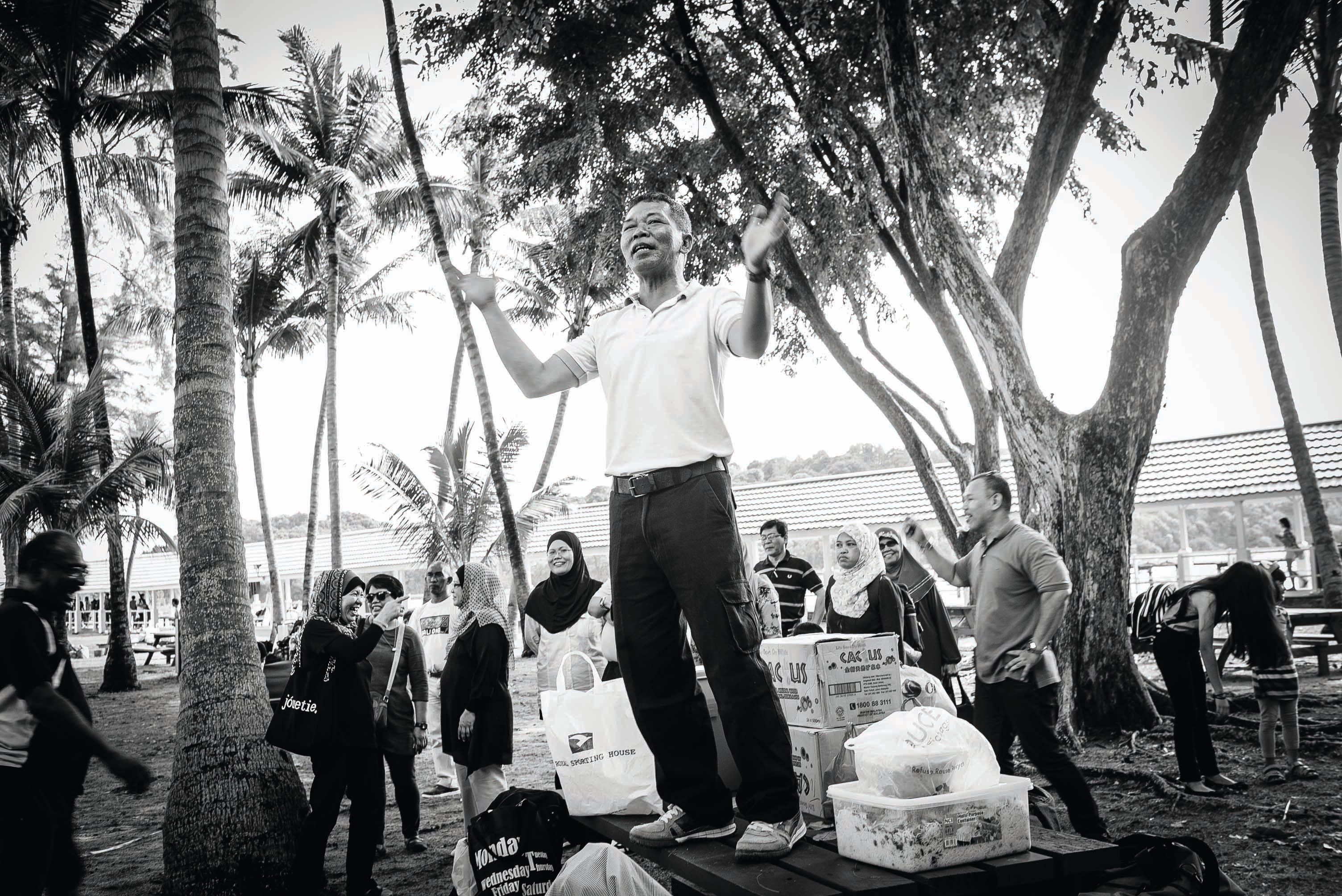 Hashim Daswan, 53, briefs his fellow former islanders during their visit to the southern islands on 9 November 2014. Photo by Edwin Koo.