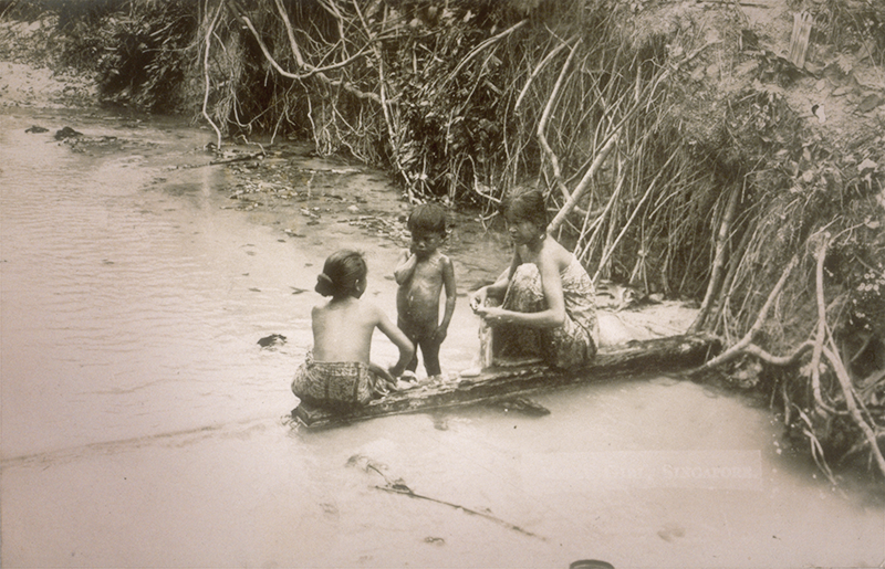 Washing in a stream, c.1910s. Lim Kheng Chye Collection, courtesy of National Archives of Singapore.