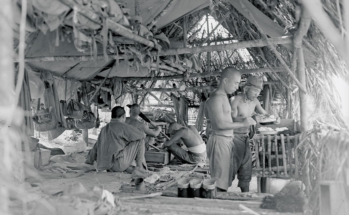Japanese soldiers sharing cooked rice, 1945. Imperial War Museums (A 30962).