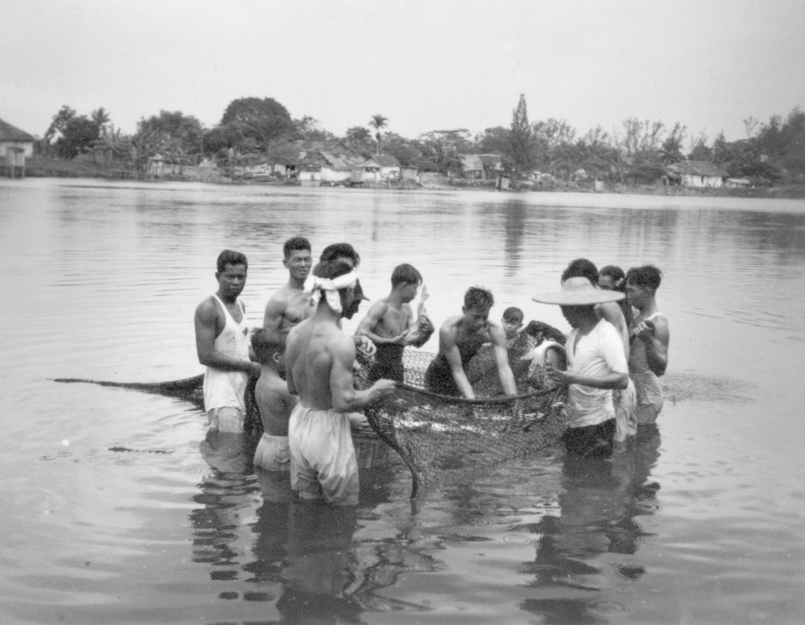 Fishermen with the day’s catch, 1951. Ministry of Information and the Arts Collection, courtesy of National Archives of Singapore.