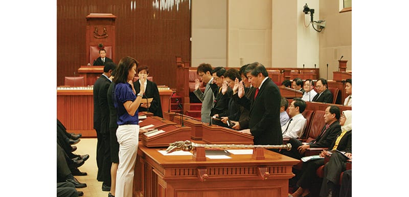 Nine nominated members of Parliament taking their oath of allegiance at Parliament House before Parliament sitting on 20 July 2009. Ministry of Information and the Arts Collection, courtesy of National Archives of Singapore.