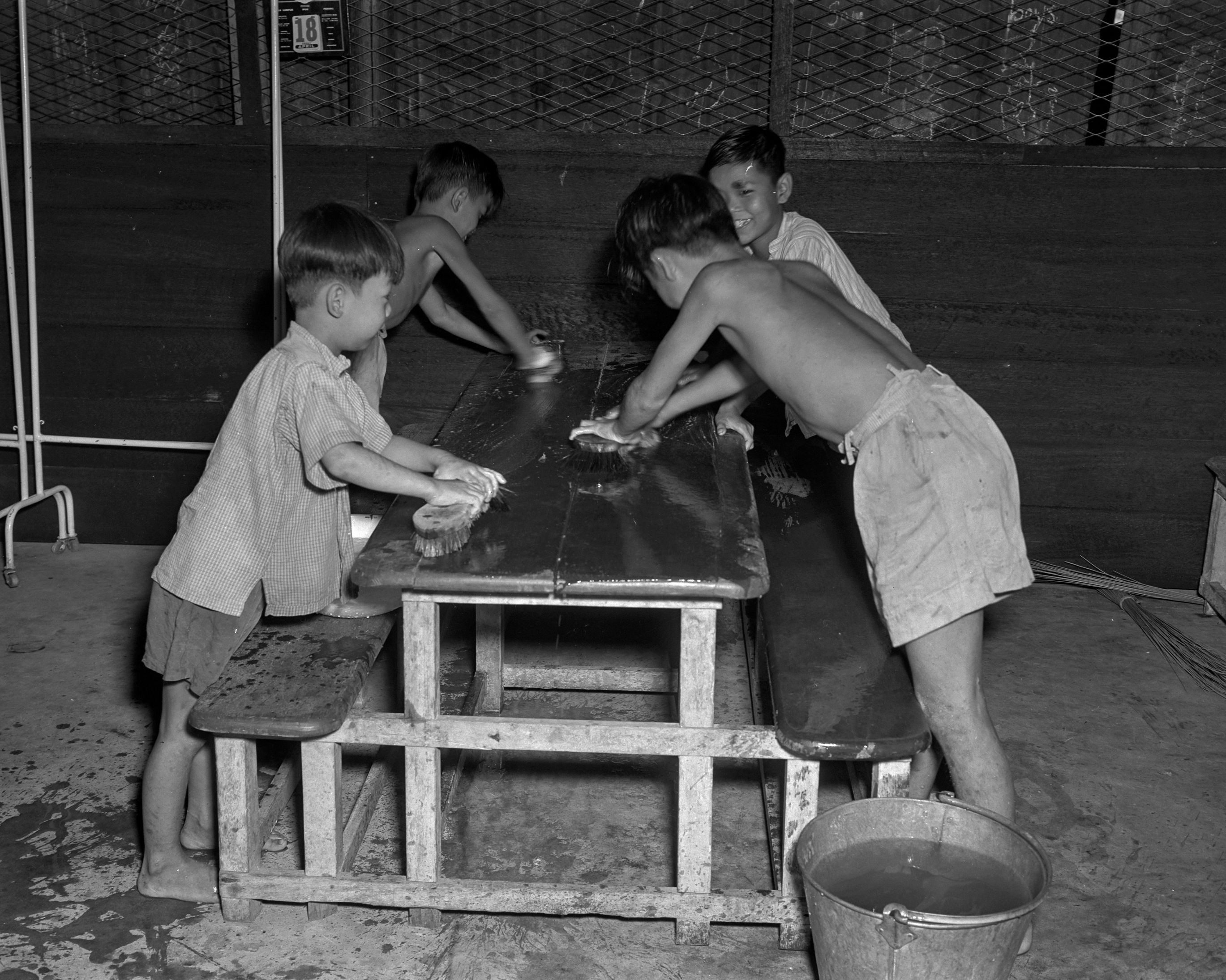The Children’s Social Centres sought to teach children daily living skills and good habits such as cleaning up after themselves, 1952. Ministry of Information and the Arts Collection, courtesy of National Archives of Singapore.
