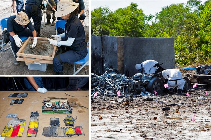 Investigators sift debris and examine evidence from an apparent explosion.