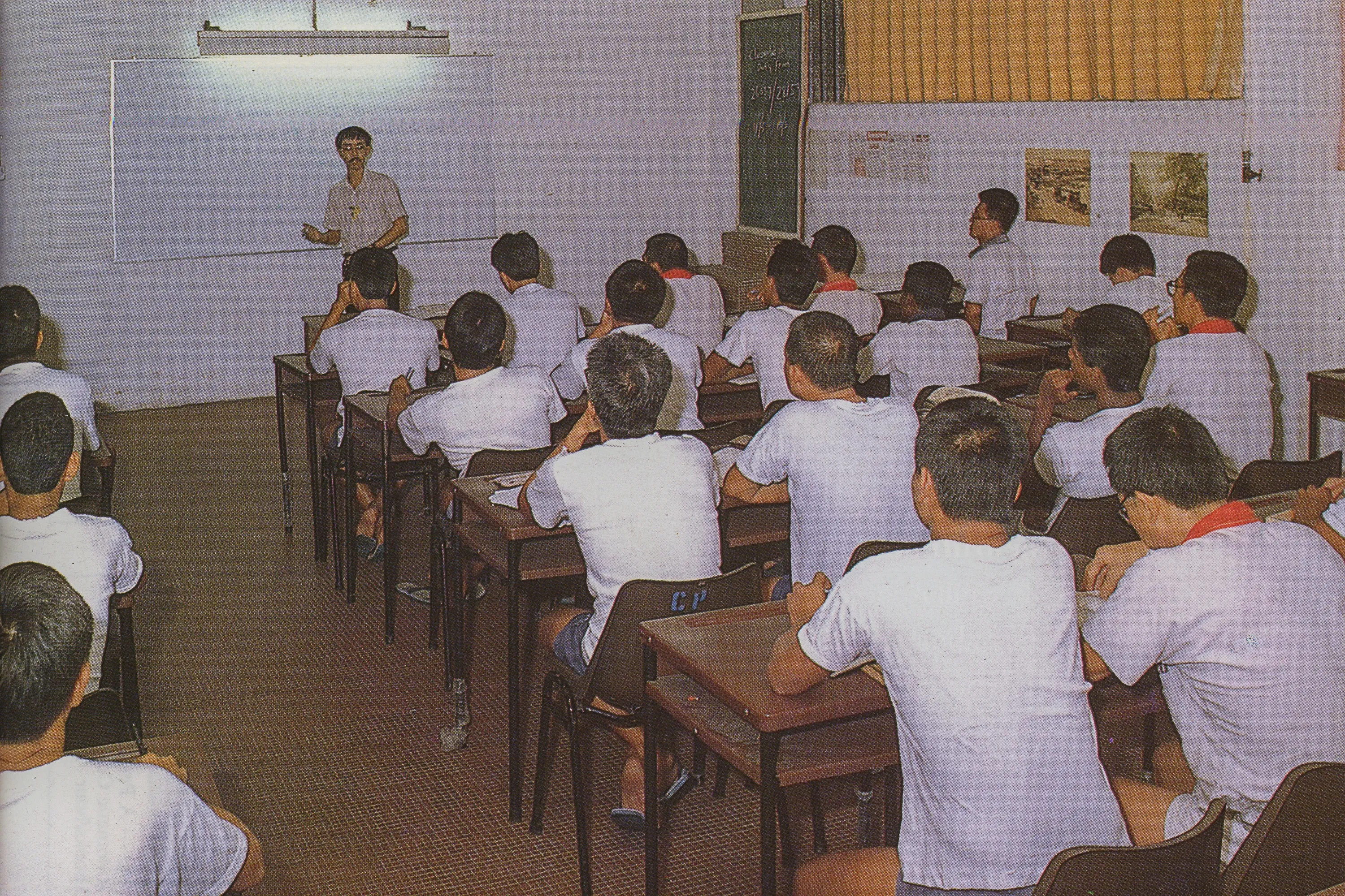 A photo showing the inmates undergoing training in a classroom.