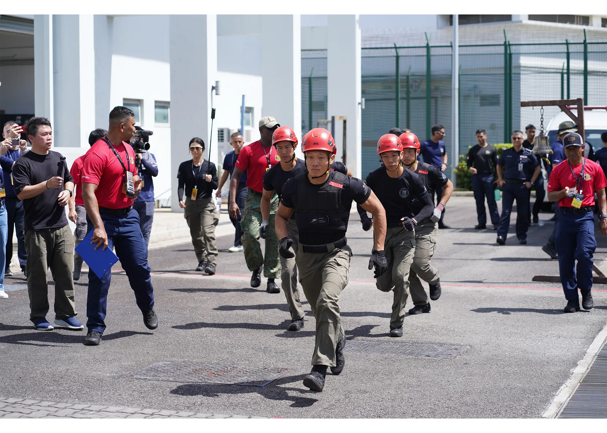 A group of determined looking officers seen to be running towards their next challenge