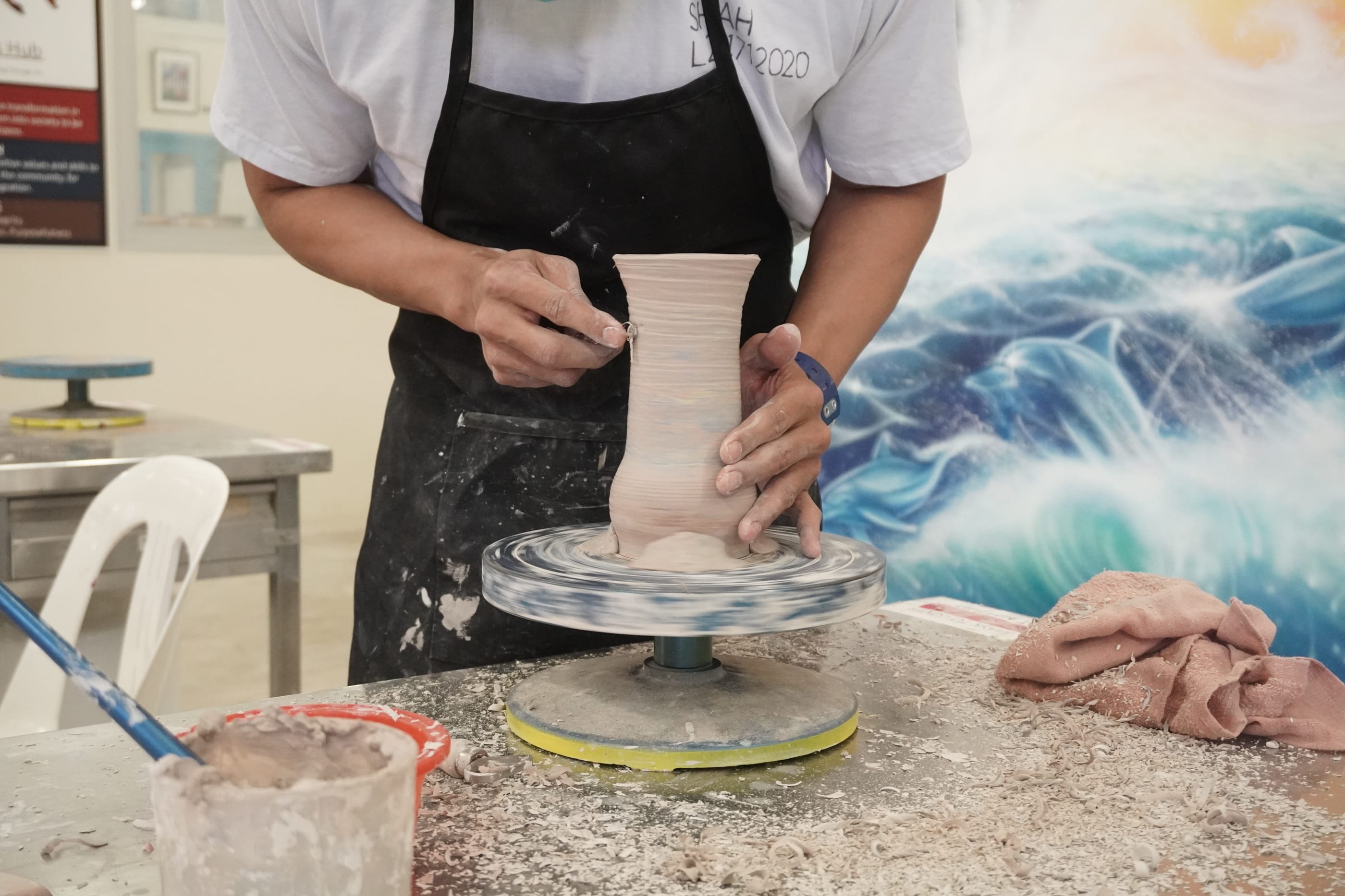 An inmate doing clay modelling.