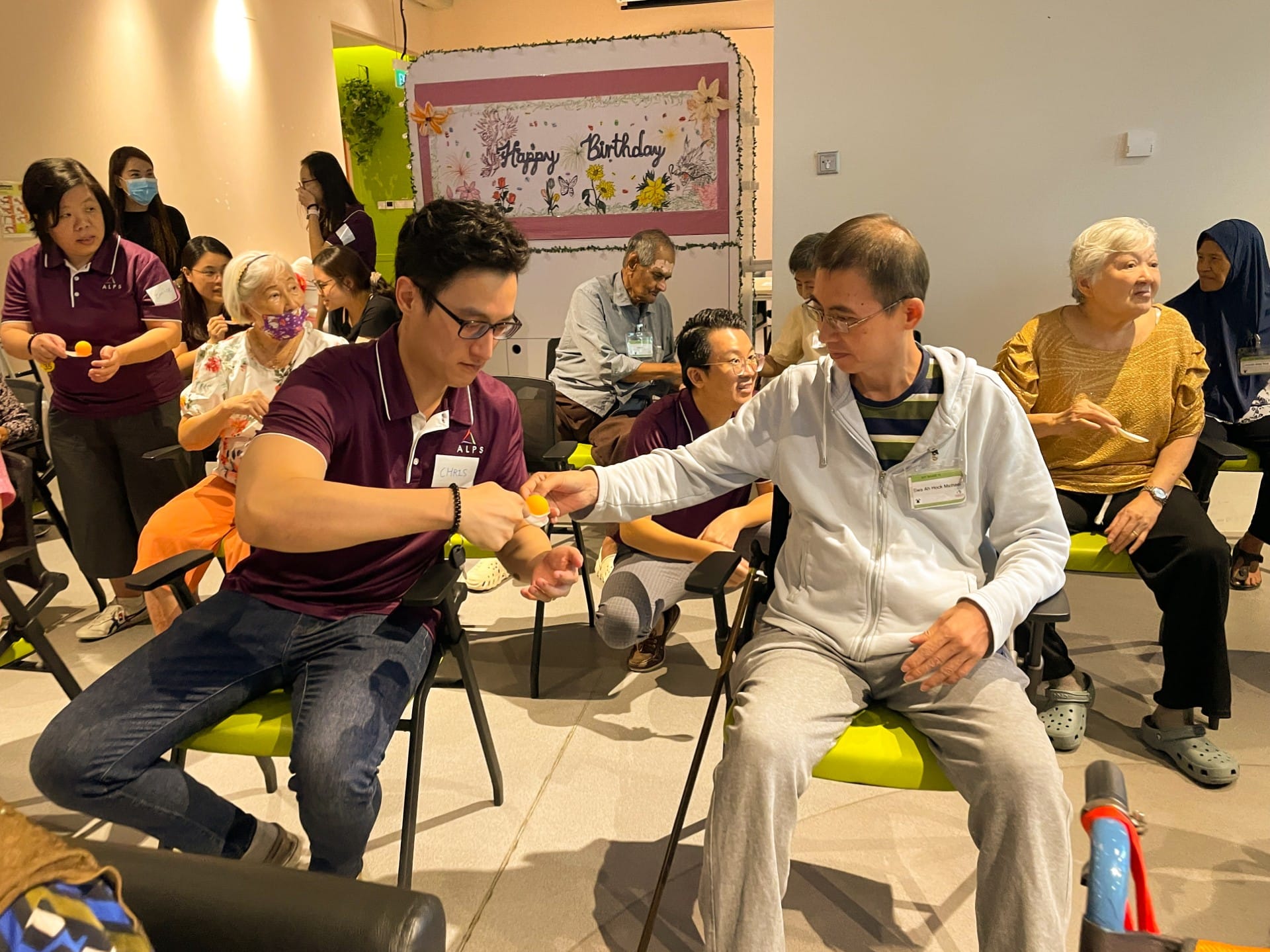 Image of ALPS Staff interacting with the patients at HCA Hospice Oasis@Outram