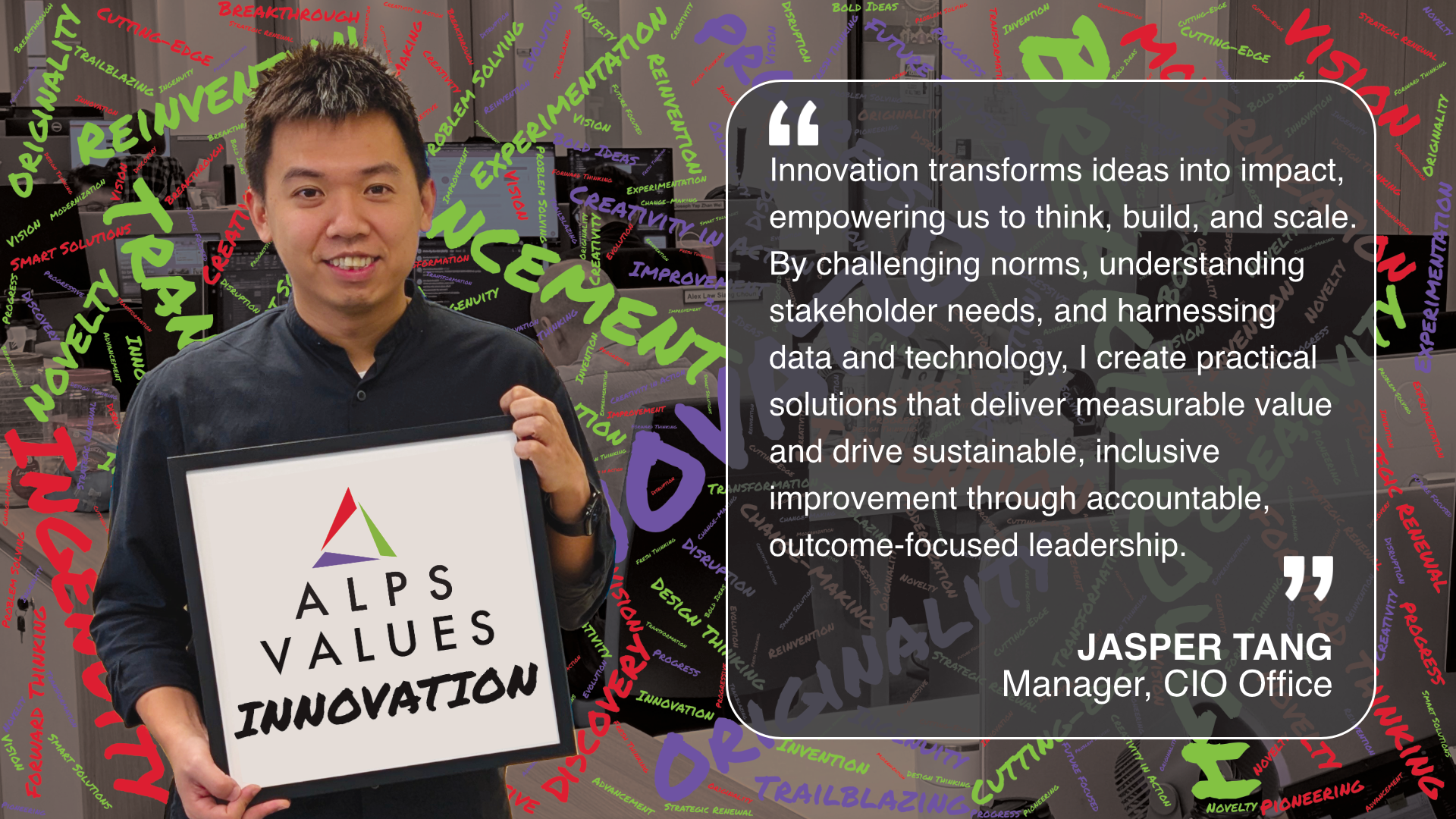 Image of ALPS colleague holding card displaying words 'ALPS Values Innovation'