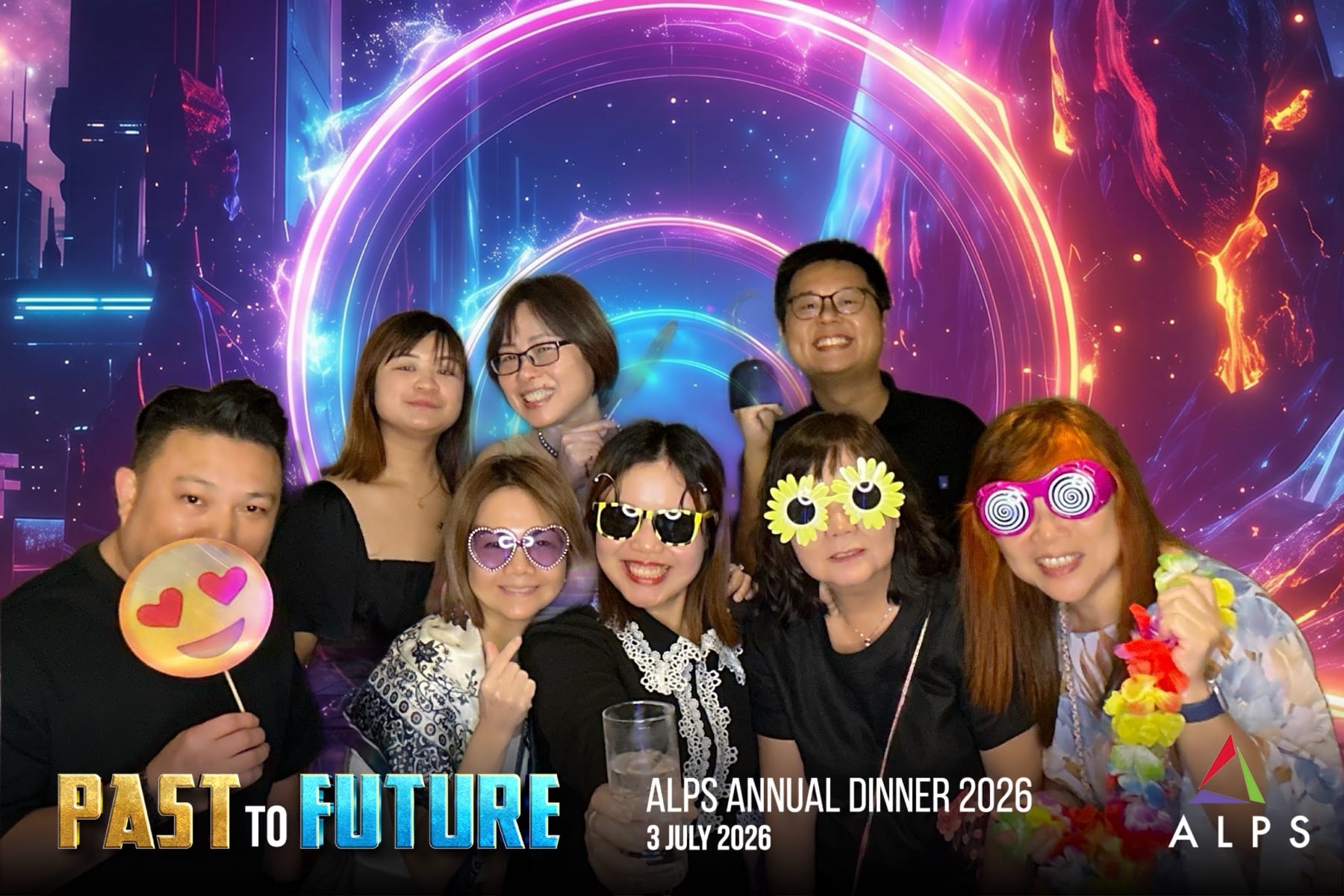 Photo of 8 ALPS staff taken at a virtual photo booth at ALPS Anniversary Dinner
