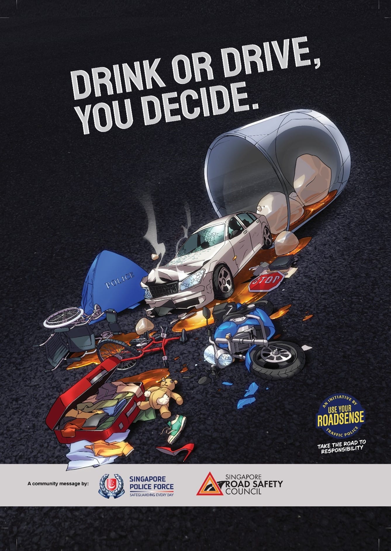 "Drink or Drive, You Decide" poster with a shattered car, police items, a teddy bear, and a large overturned glass.