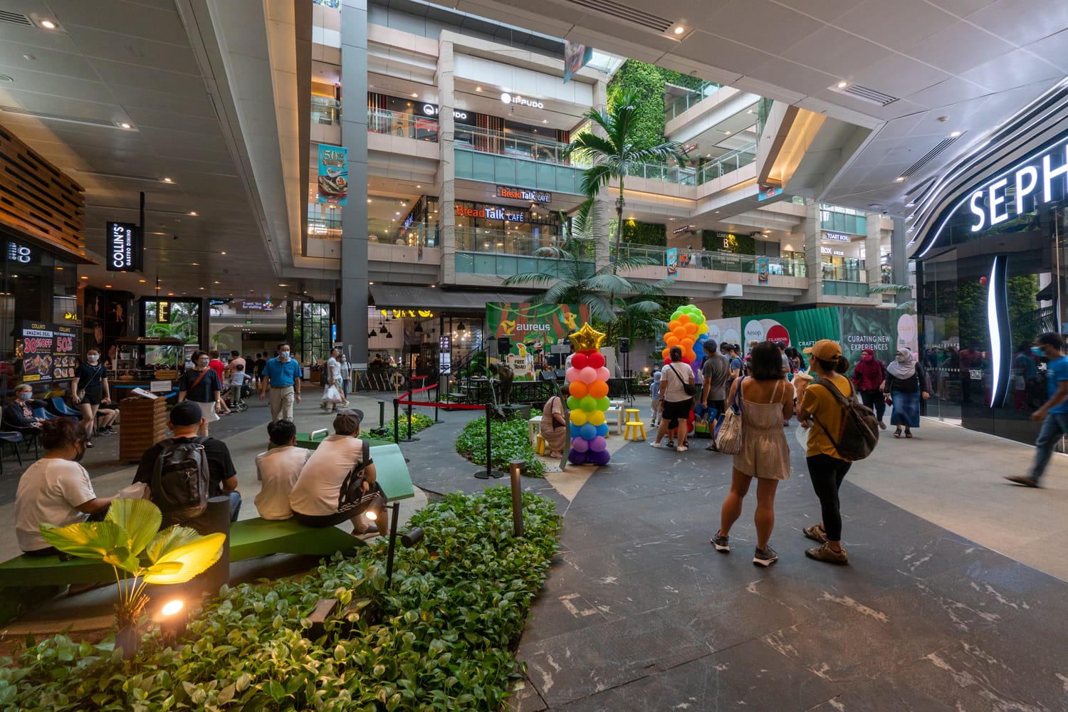Greenery and natural ventilation at the Westgate Mall courtyard create a pleasant environment for shoppers.