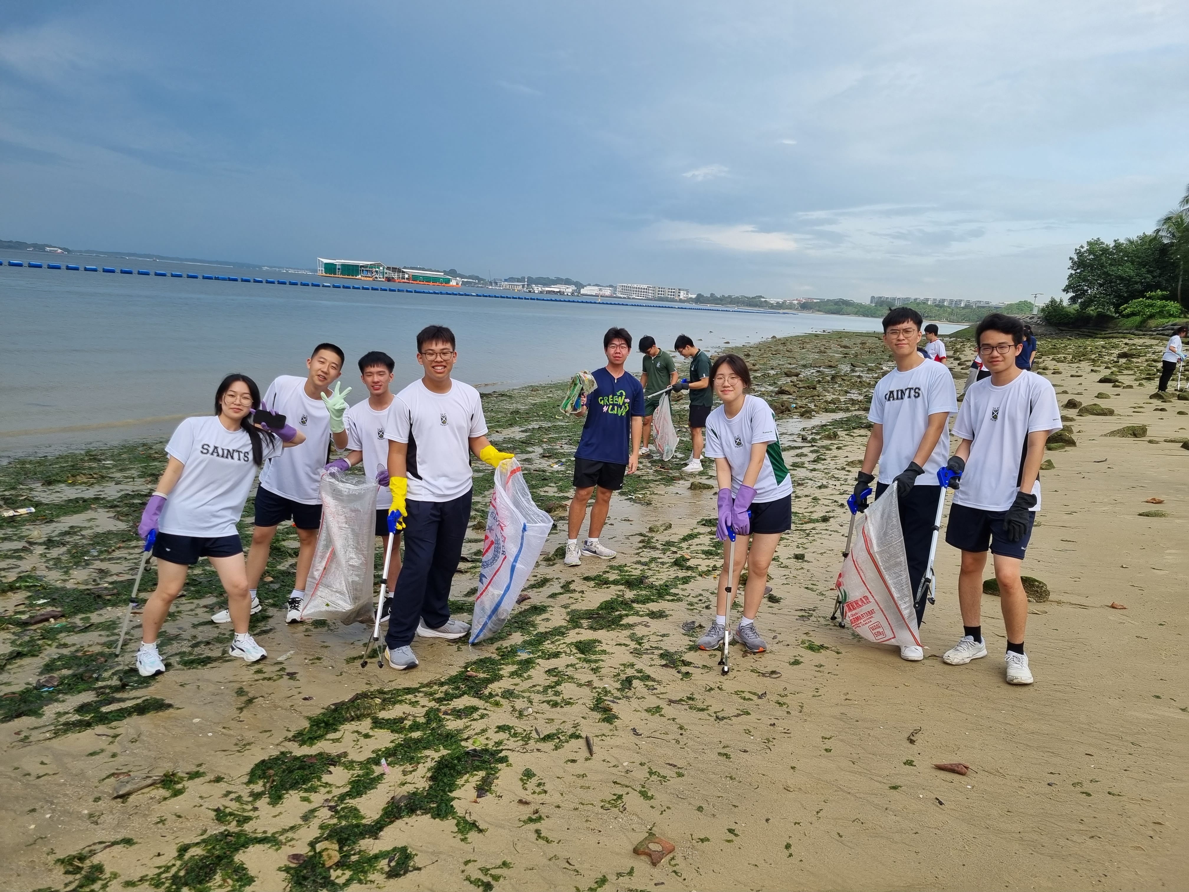 Litter picking at Pasir Ris Beach in collaboration with National Junior College