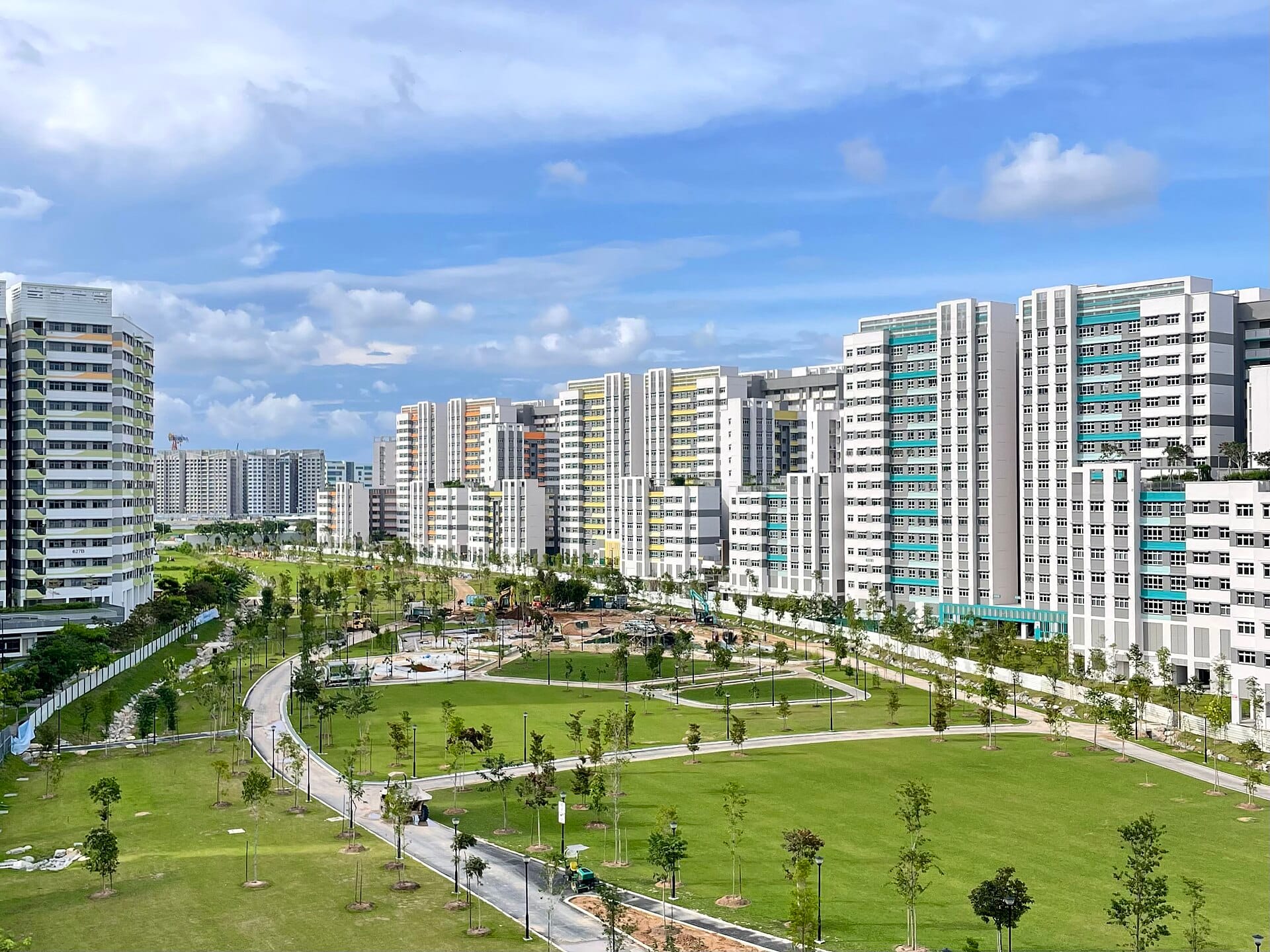 View of Tampines MRT station with surrounding buildings and trees, and text "START YOUR JOURNEY" on the right.