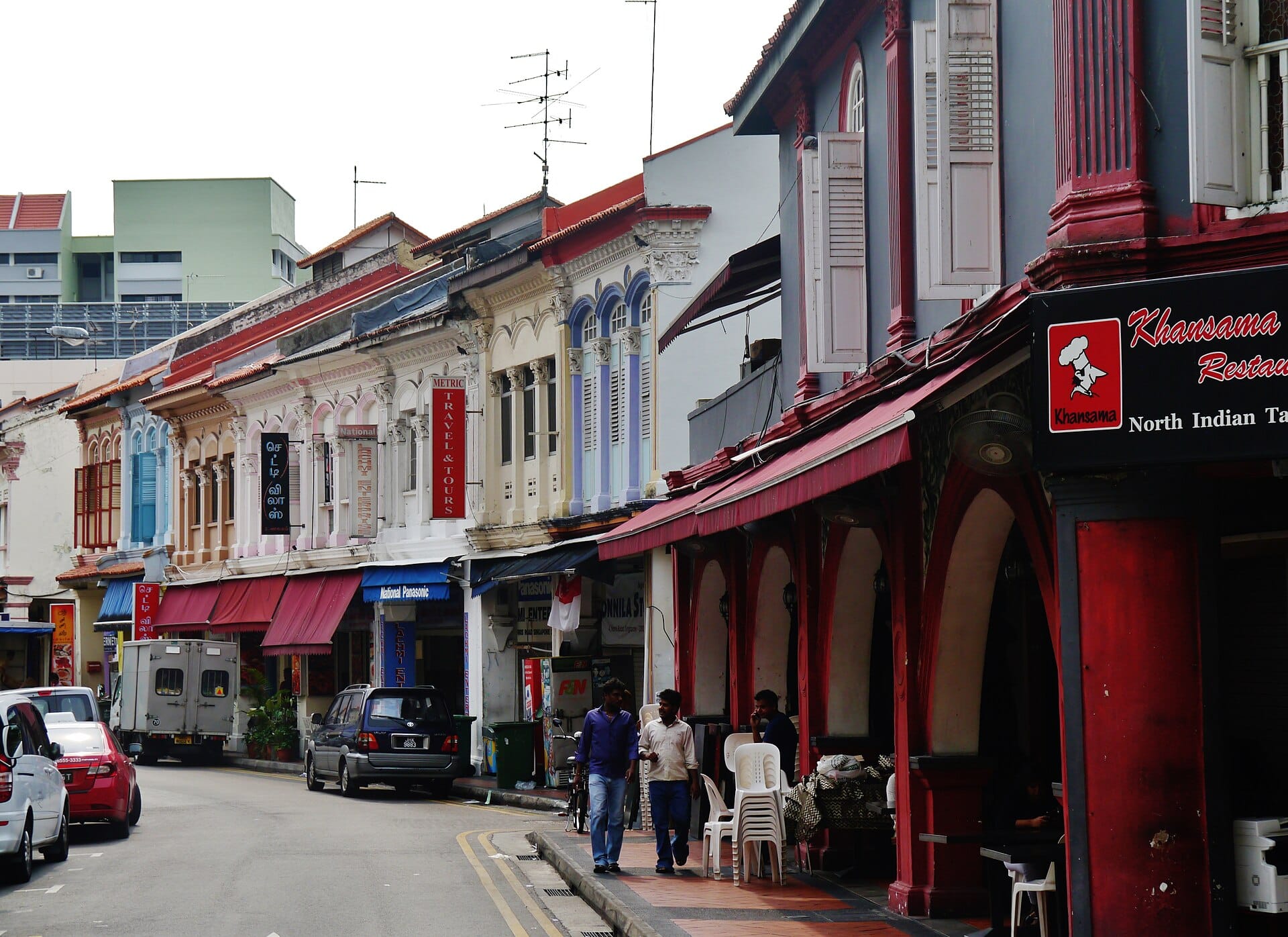 Little India street scene with colorful decorations and text: "Little India & Its Streets" and "Start Your Journey".