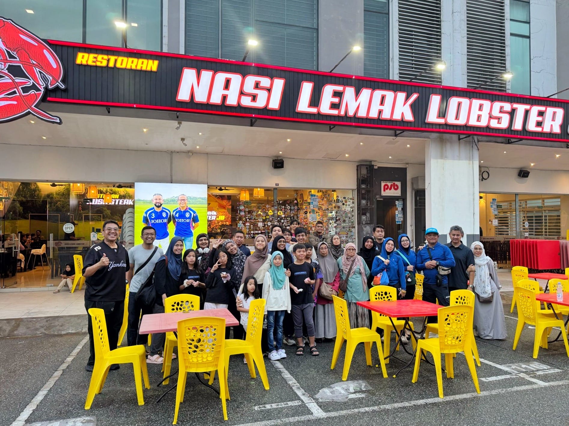 Group photo of participants gathered outside a restaurant at the end of the trip.