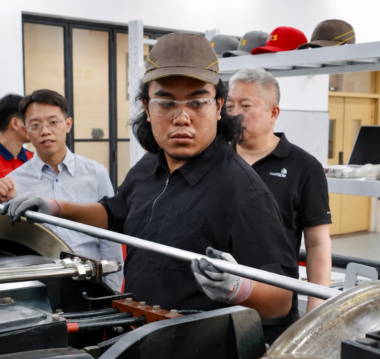 Arfan Amirun, Team RP’s Rail Vehicle Technology competitor, working on rail equipment during a training session.