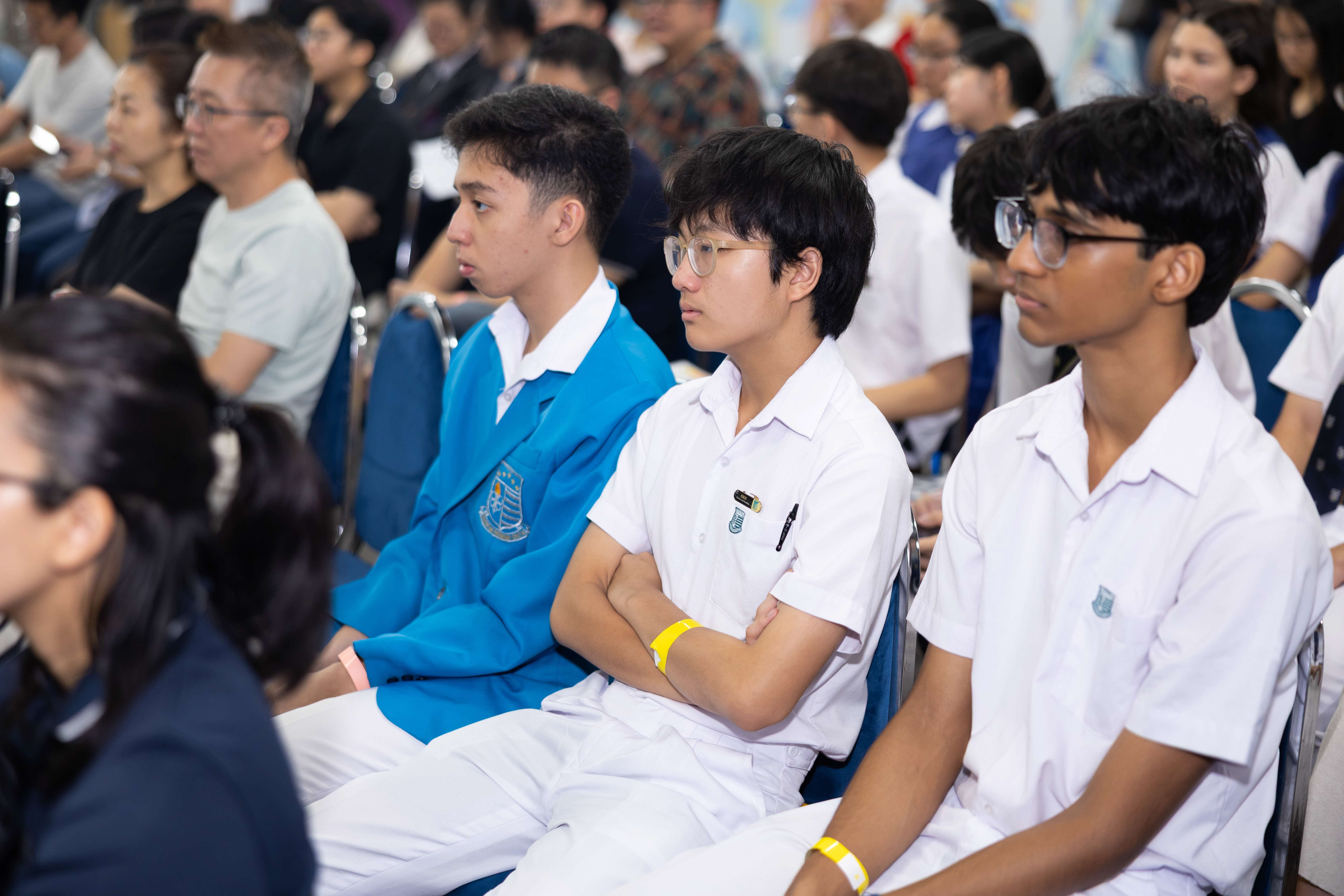 Image of student in the audience at the event