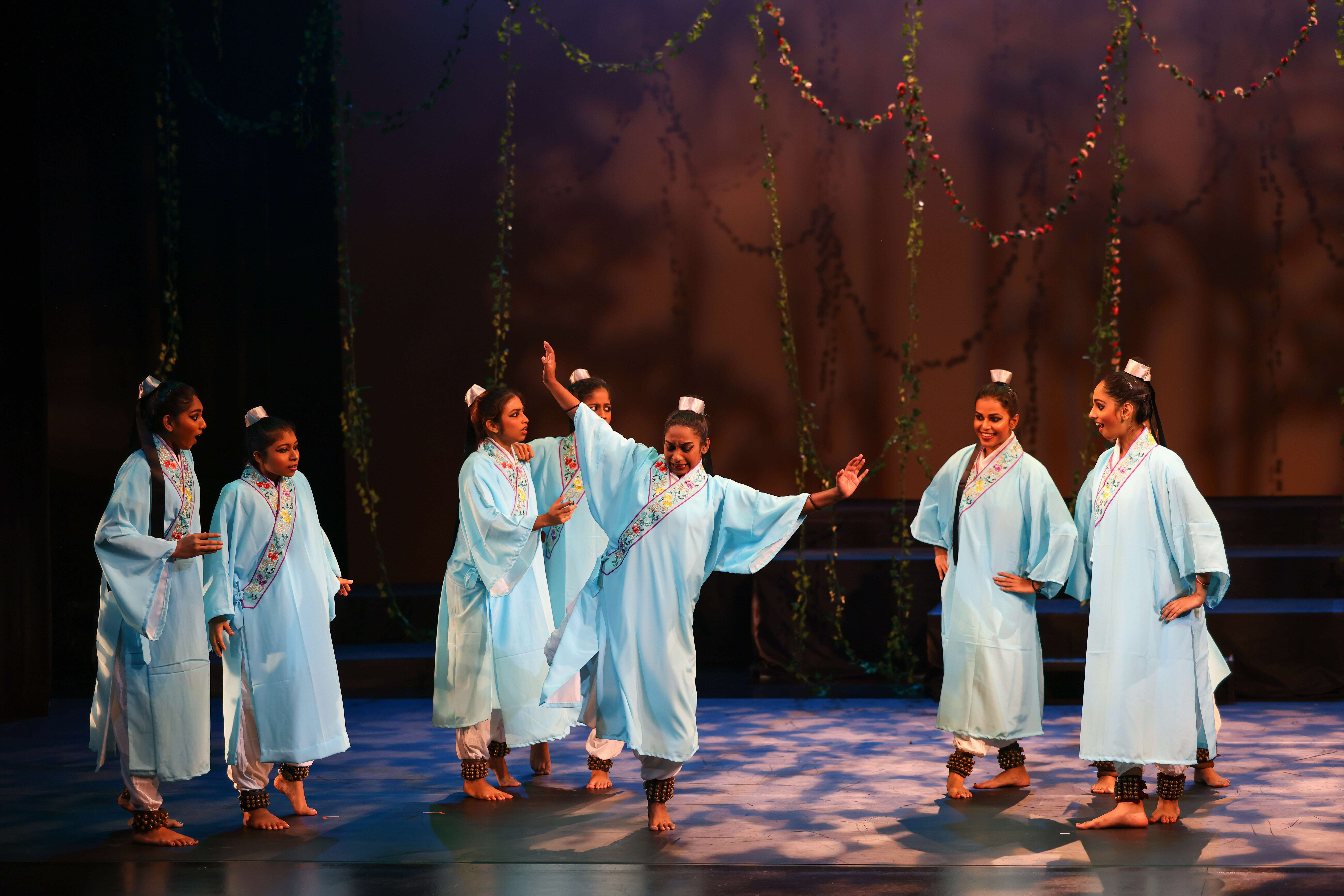 Dancers in traditional Chinese costumes. Image credit: Bhaskar's Arts Academy