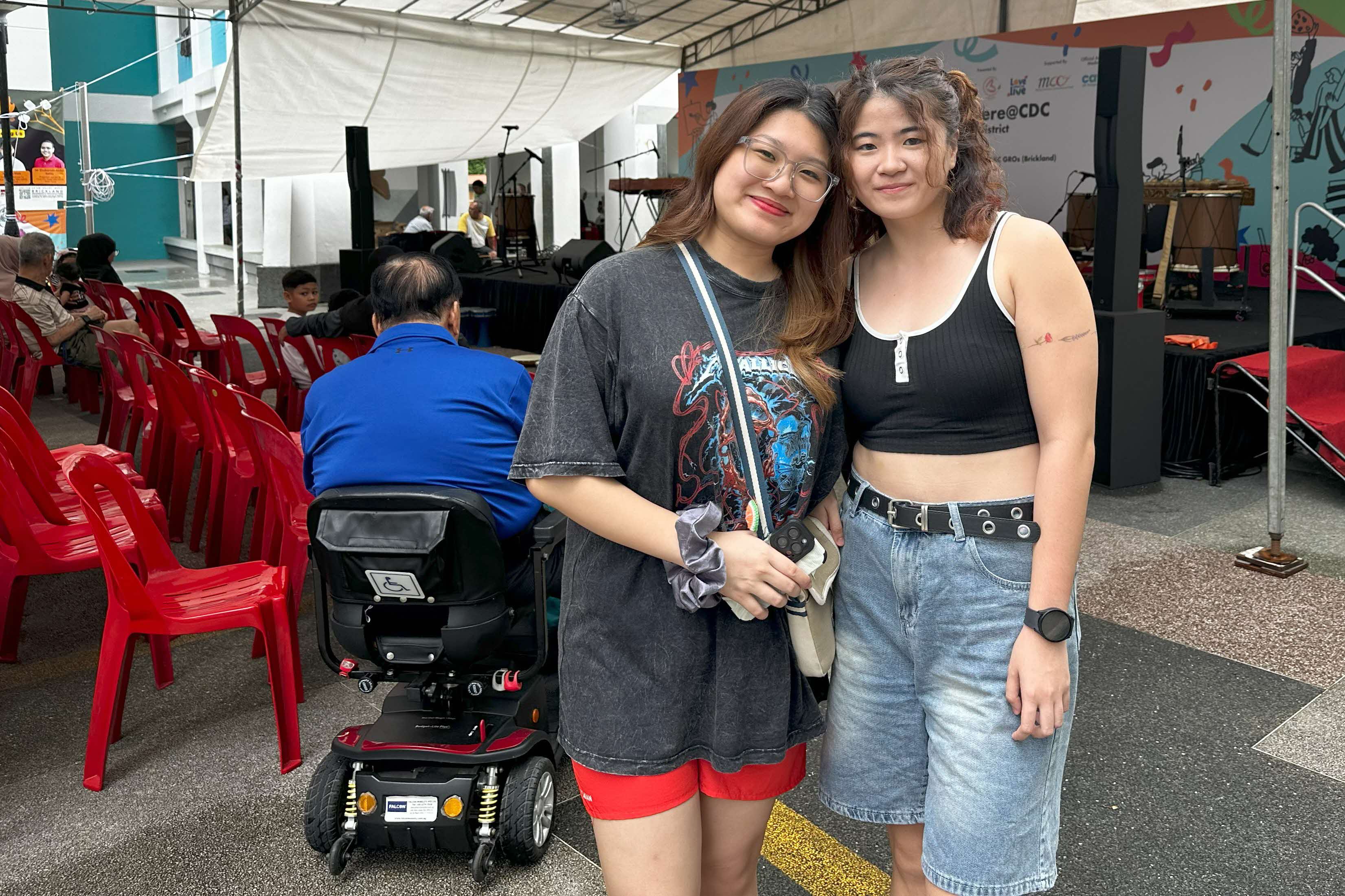 Gen Z Singaporeans Tiffany and Wei Xuan at a performance of ArtsEverywhere@CDC in Choa Chu Kang