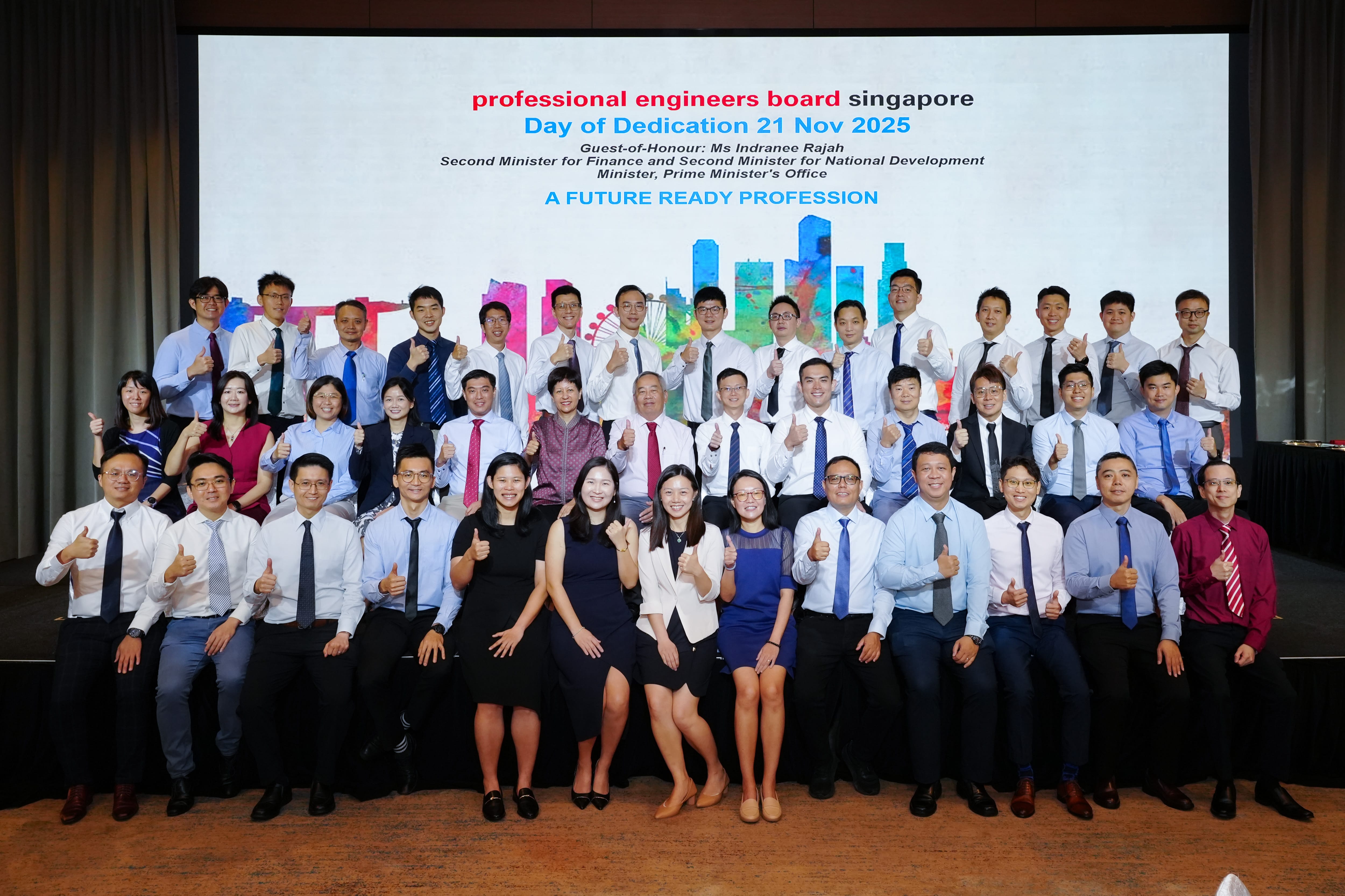 Group photo of about 40 people giving thumbs up at Professional Engineers Board Singapore Day of Dedication, 21 Nov 2025.