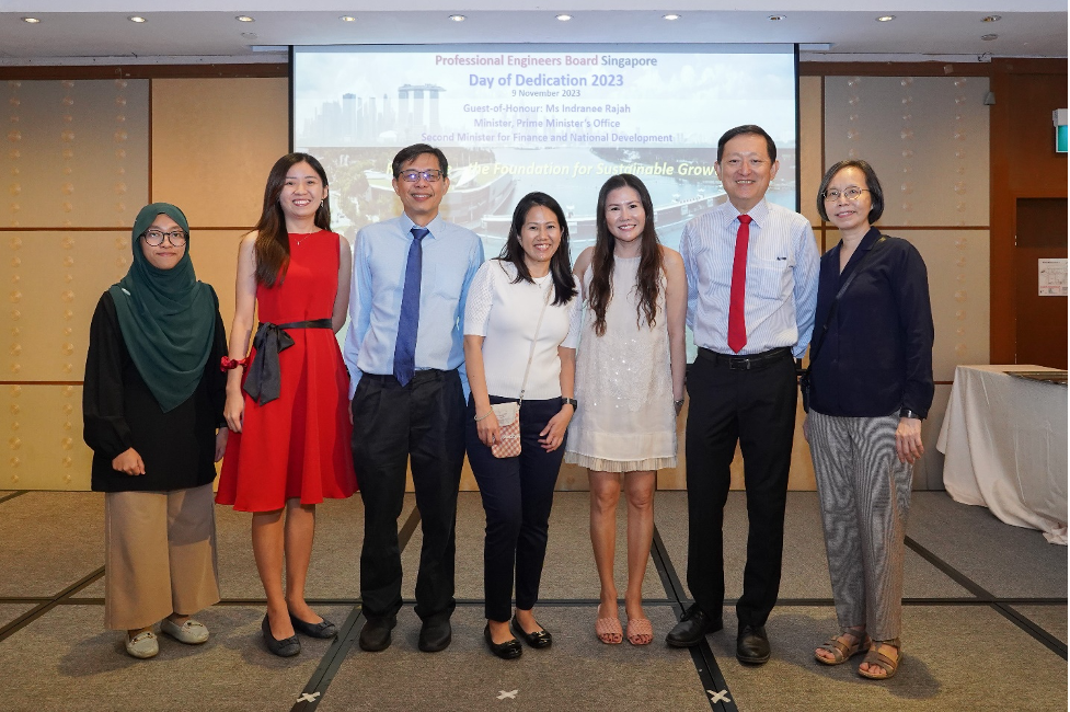 Seven people pose together at the Professional Engineers Board Singapore Day of Dedication 2023 event.