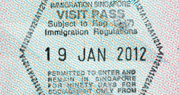 Singapore Immigration Visit Pass stamp dated 19 Jan 2012, permitting 90-day entry for social visit.