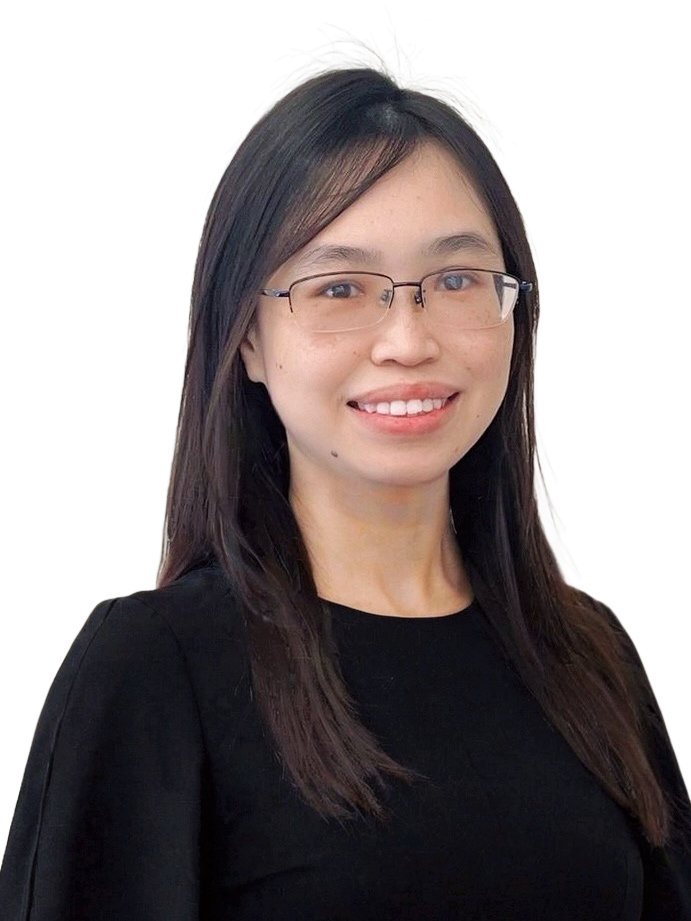 Woman with glasses in black suit