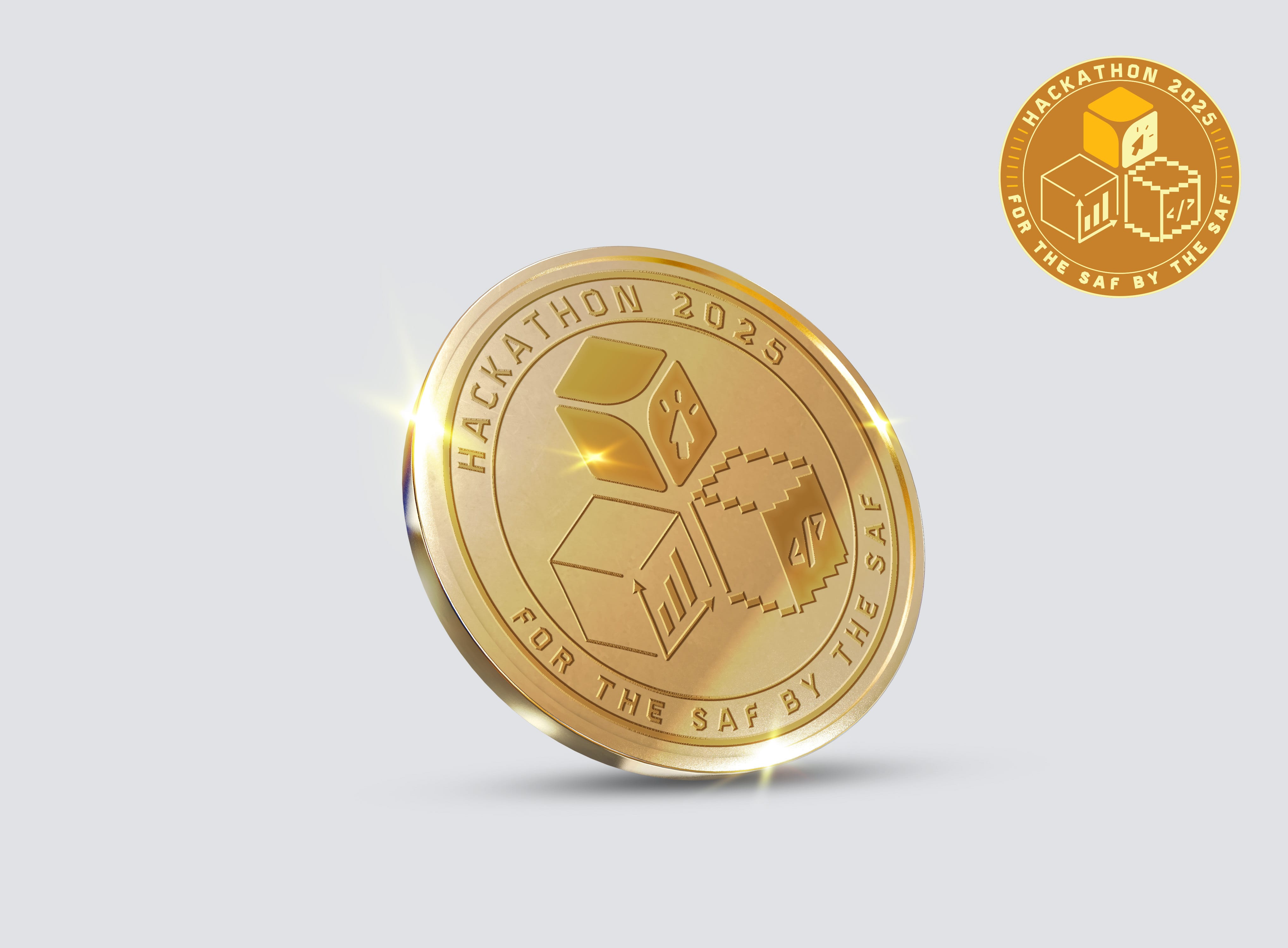 Gold coin engraved with "Hackathon 2025 For the SAF By the SAF" and cube icons, with a matching badge top right.