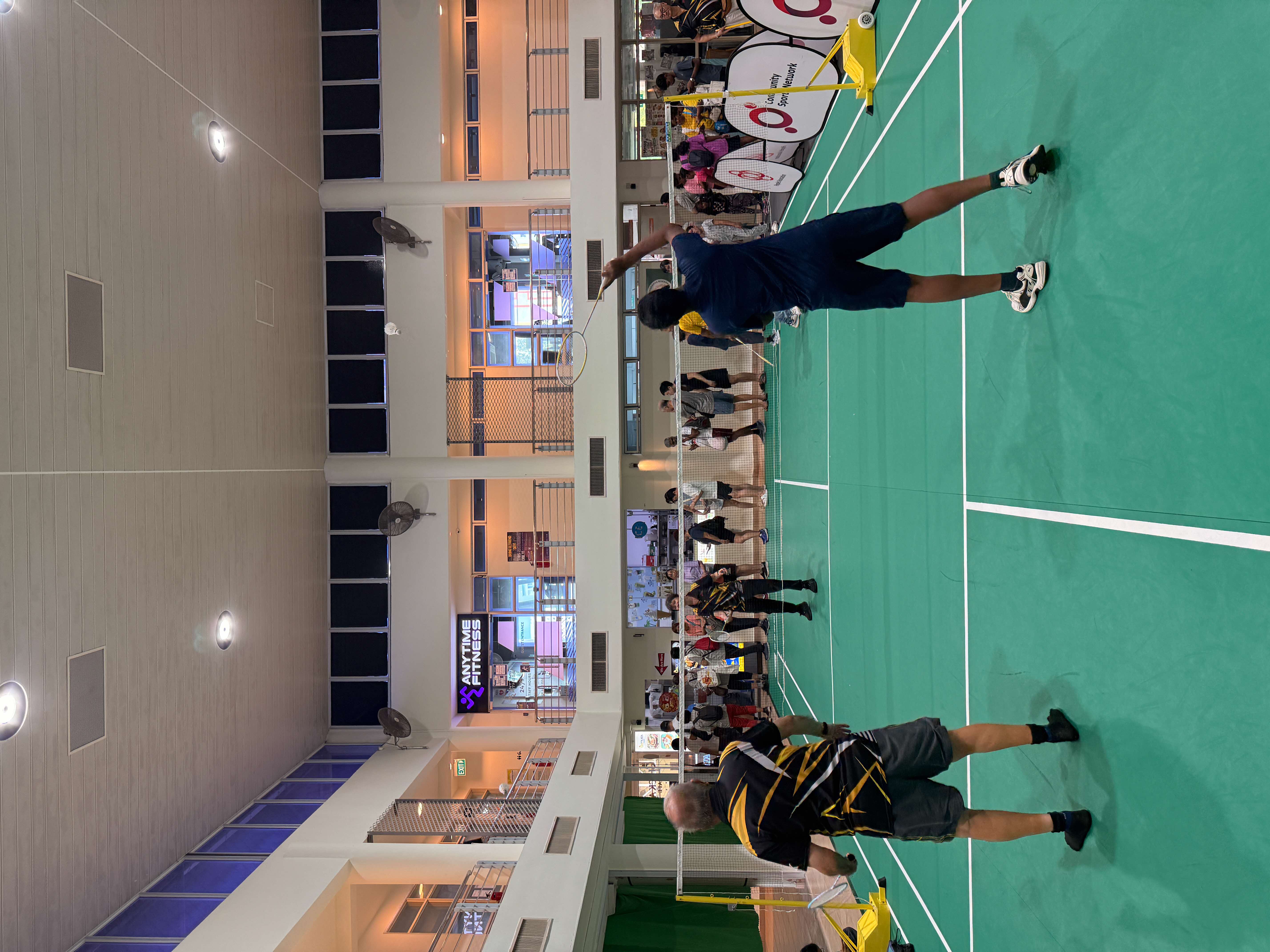 Residents playing badminton court in CC