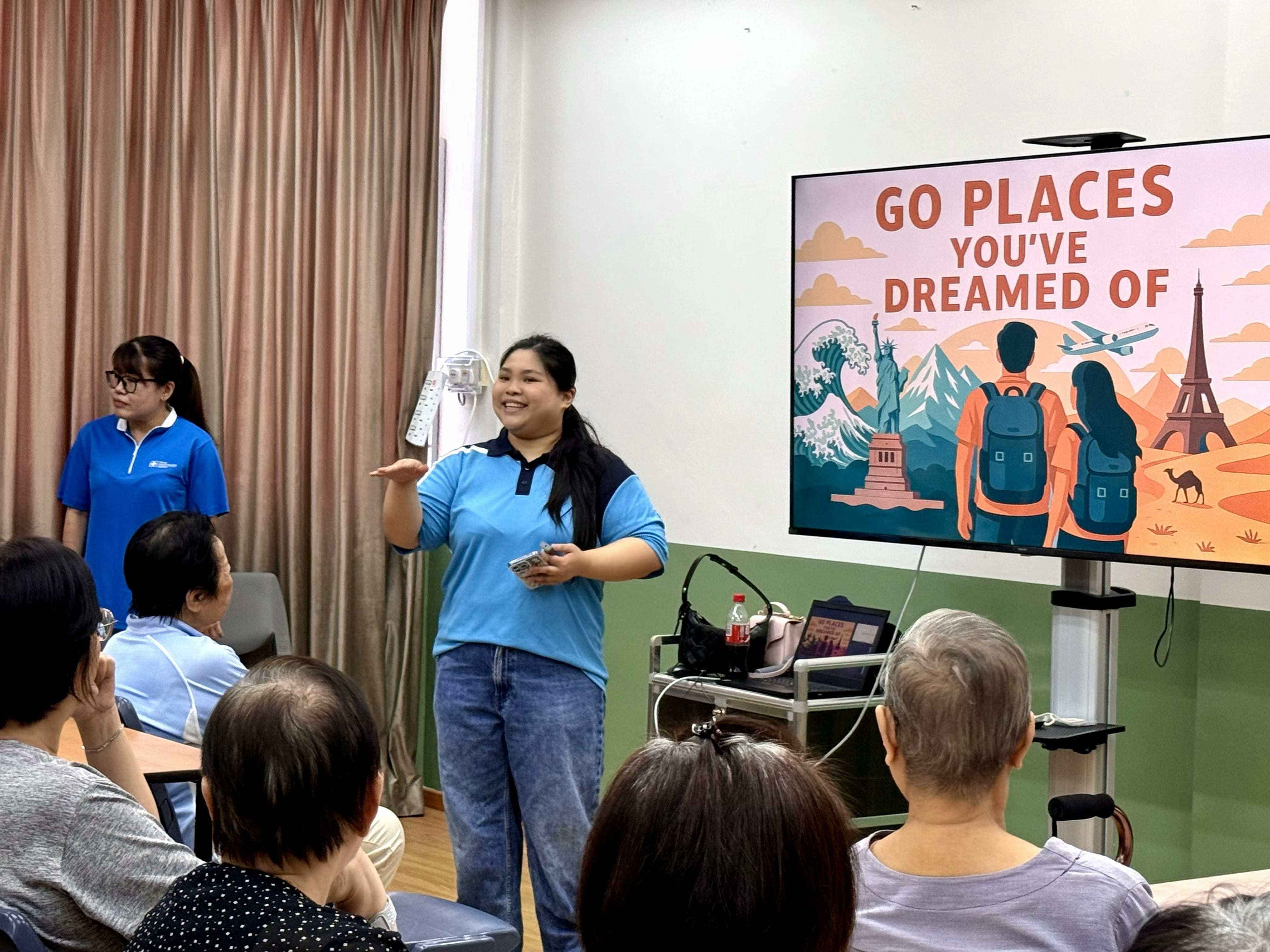 lady presenting to attendees