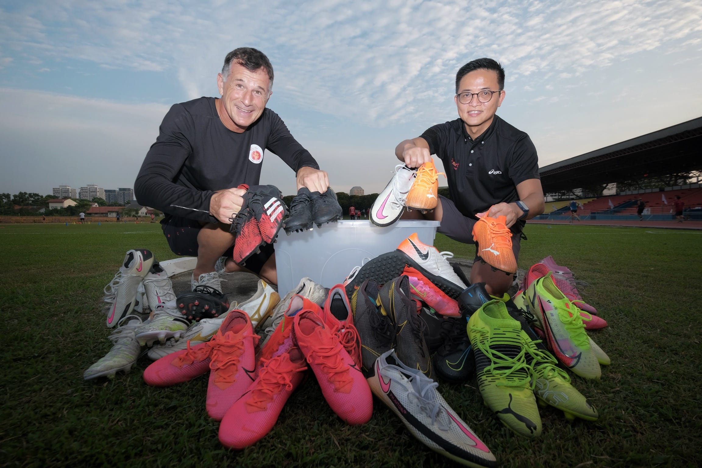 Football: S'pore Premier League players donate used boots to underprivileged youth (2021)