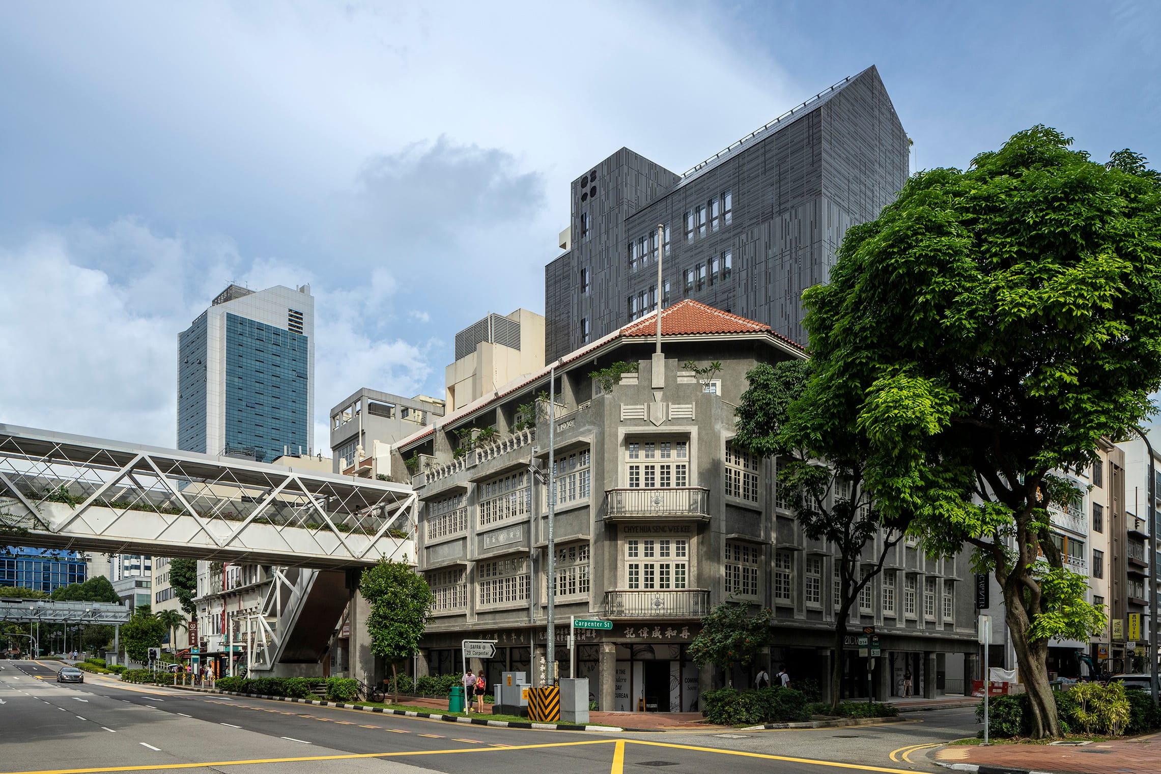 21 Carpenter by WOHA Architects elegantly integrates conserved 1936 shophouses with a contemporary extension