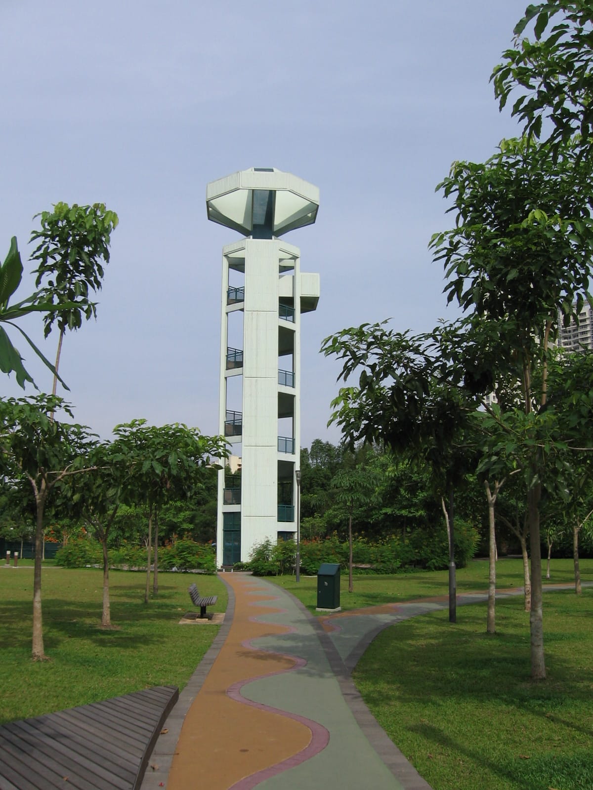 Viewing tower in Toa Payoh Town Park surrounded by trees and walking paths
