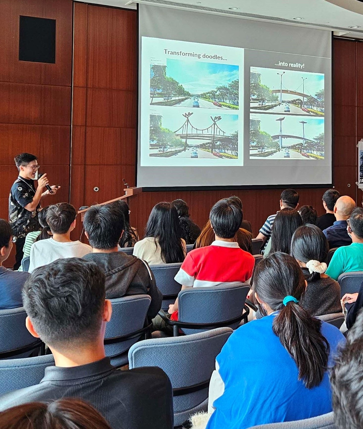 A group of audience listening to a sharing.