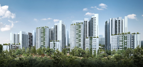 Apartment complex with tall, modern buildings surrounded by lush green trees under a blue sky.