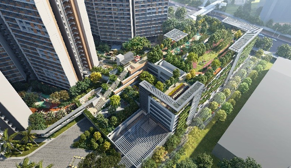 Aerial view of buildings with green spaces and roof gardens.