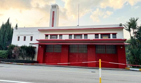 Exterior of the white and red Hill Street Fire Station building in Singapore.