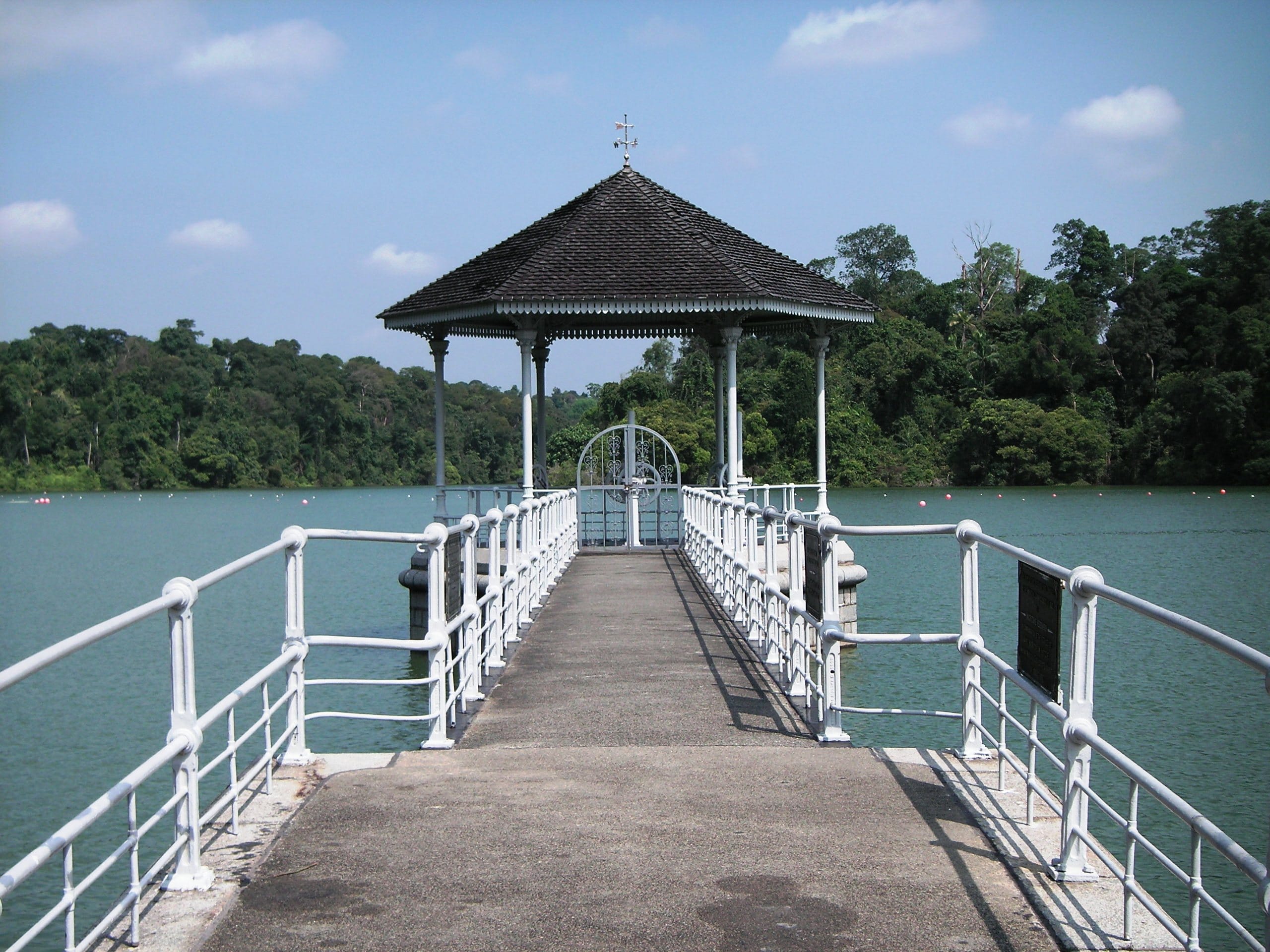 Historic water intake pavilion connected by a bridge over MacRitchie Reservoir