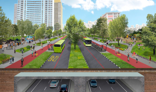 City park with bus lanes, playground, vendors, and pedestrian paths, shown above a highway tunnel.