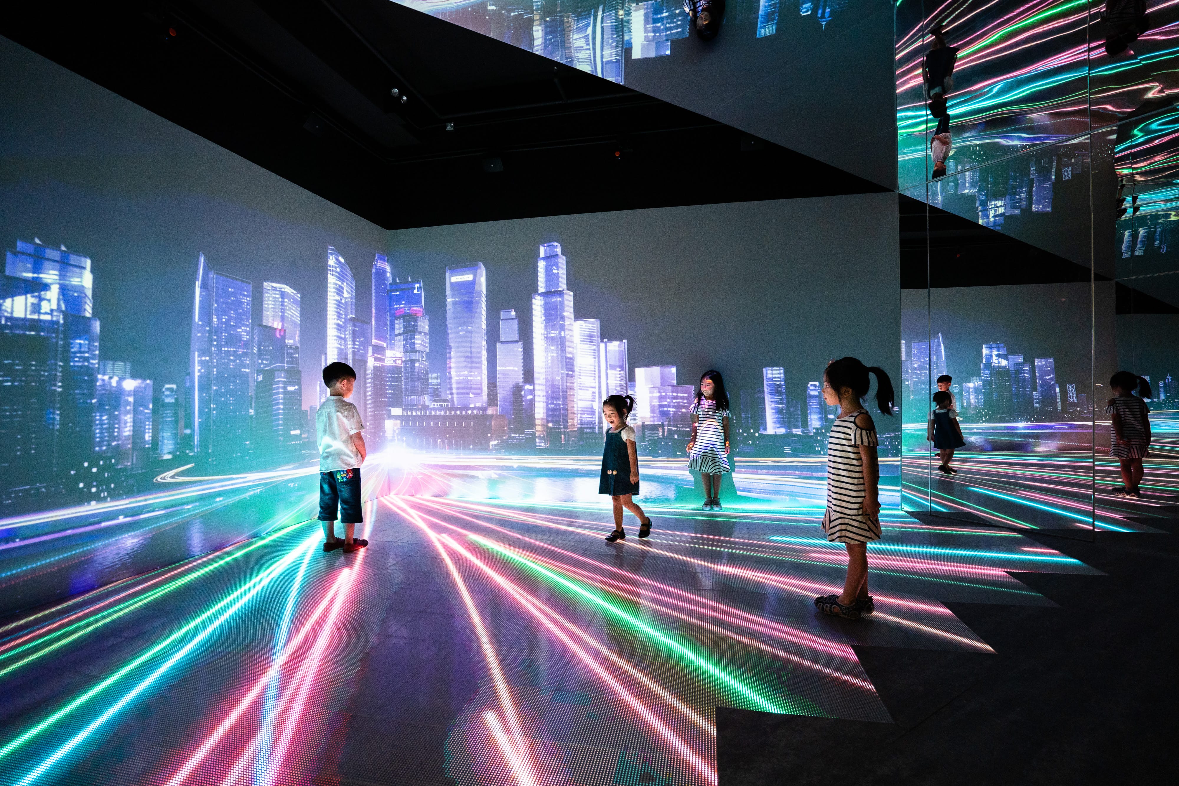 Children in an immersive exhibition space