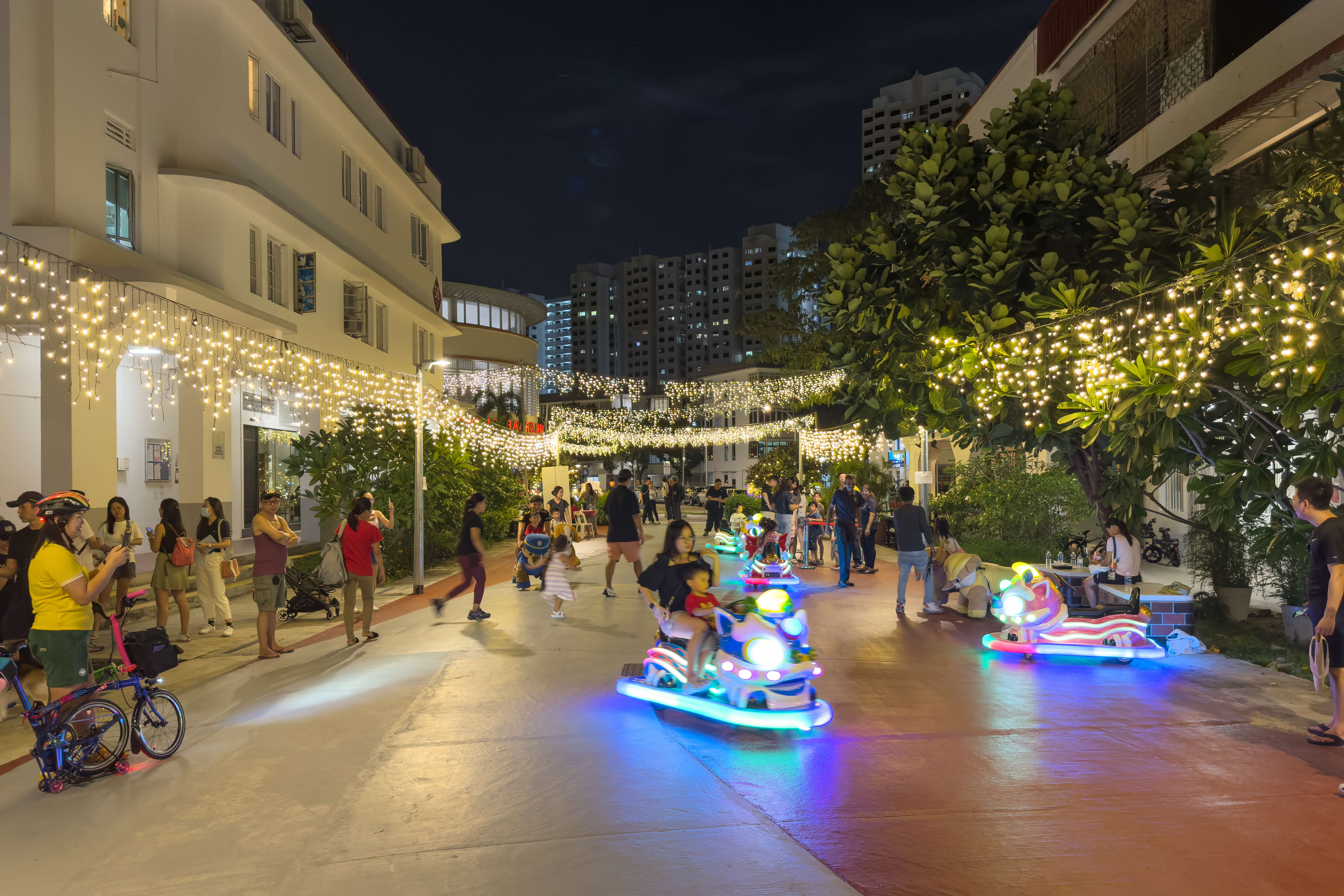 Photo of vibrant activities at road closure at Streets for People