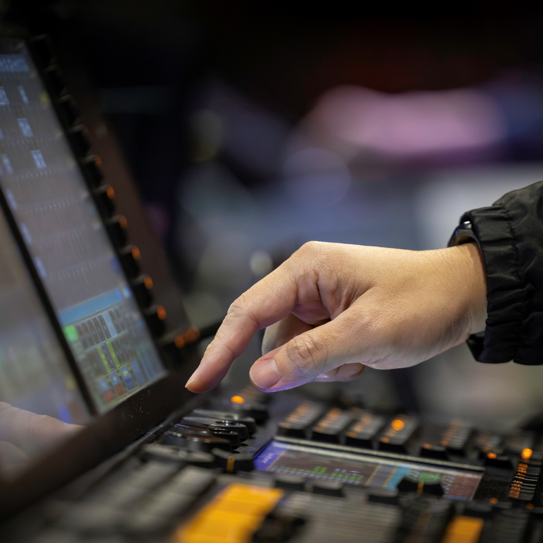 Image of a DMPC member working behind-the-scenes at an event 1